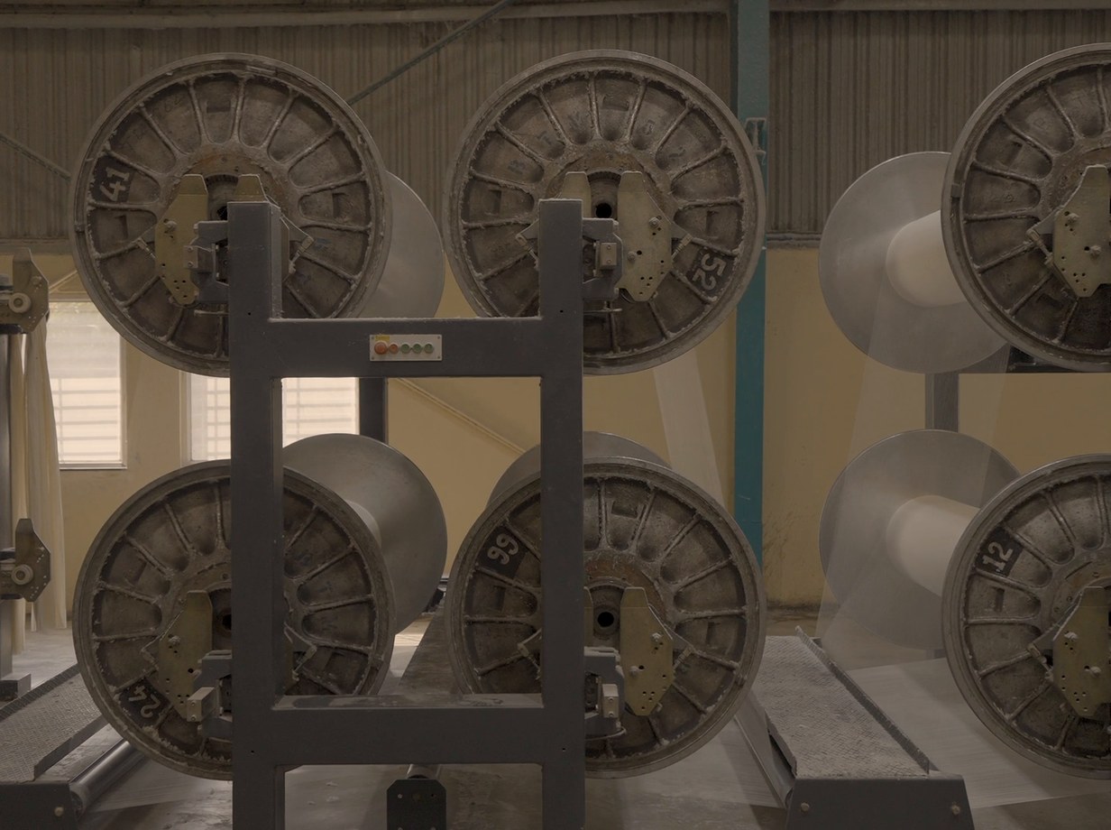 Warp beams on the floor at Alpenol's plant